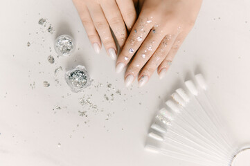 Master performing a professional manicure at beauty salon, on-line manicure training course. Nail...