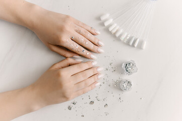 Master performing a professional manicure at beauty salon, on-line manicure training course. Nail...