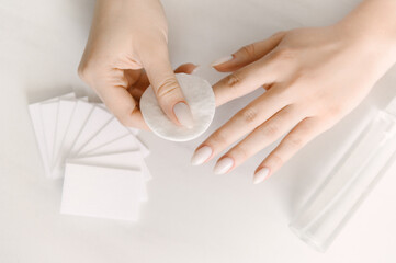 Master performing a professional manicure at beauty salon, on-line manicure training course. Nail beauty blogging. Selective focus, nail design