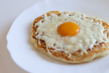 Adjarian khachapuri in a frying pan. Dietary low-calorie khachapuri with cottage cheese dough on a white plate. Proper nutrition. simple breakfast