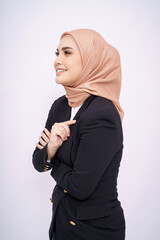 Portrait of hijab girl smiling. Pretty muslim girl. Beautiful asian muslim woman model in formal office attire posing over white background studio.