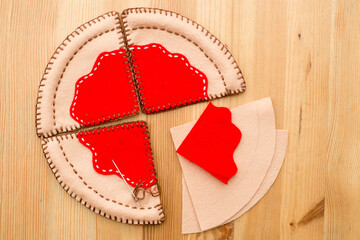 Felt pizza. Felt food toys for the kids. Preschool game for young children. Montessori education