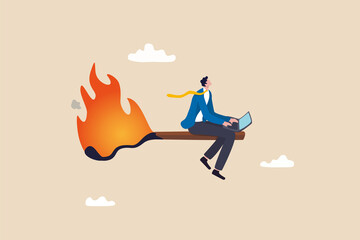 Burnout from overworked or pressure to finish within deadline, frustration or exhausted worker, despair employee or trouble concept, desperate businessman working with laptop on burning matchstick. - obrazy, fototapety, plakaty