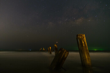 Landscape with Milky way galaxy in sea view