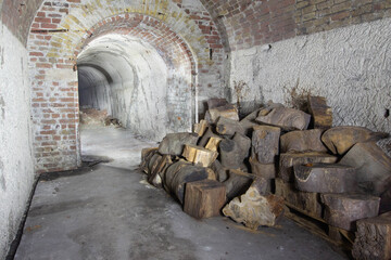 Hidden tunnel Air Raid Shelter with tree trunks in it