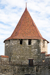 Walls and towers of a stone medieval fortress. Medieval fortress panorama. Fortress stone walls. Fortress landmark