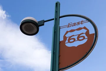 Badkamer foto achterwand Low angle view of Route 66 East sign on street light post in Albuquerque, New Mexico, USA © Anne Richard