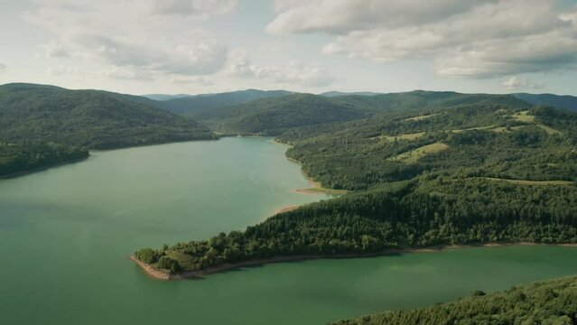 Aerial drone moving forward shot of the bays created by water dam Starina in eastern Slovakia. National Park Poloniny.