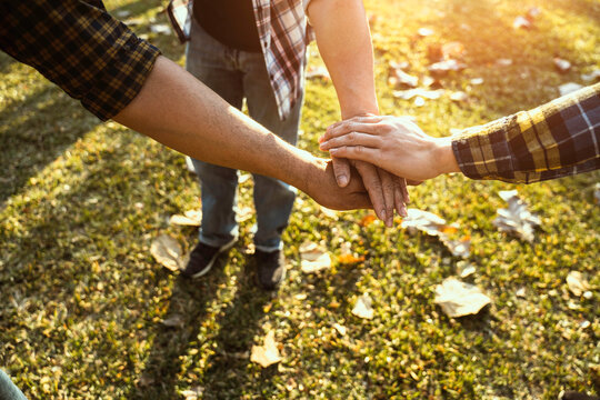volunteer hand stack people to show teamwork spirit togetherness, Concept community of charity people volunteering with social to achievement in the future, Group of people participation of charity.