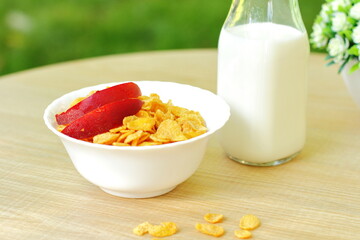 Bowls with different sorts of breakfast cereal products, white bowls with morning meal