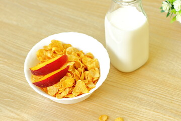 Bowls with different sorts of breakfast cereal products, white bowls with morning meal