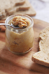 almond nut butter in a jar on table 