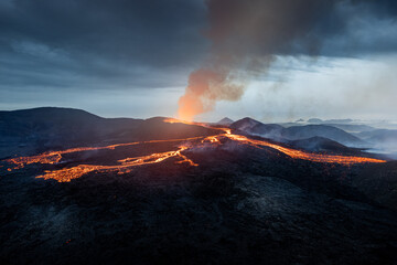 Scenic view of lava in the Fagradalsfjall volcano in Iceland on cloudy sky background