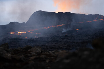 Scenic view of lava in the Fagradalsfjall volcano in Iceland on cloudy sky background