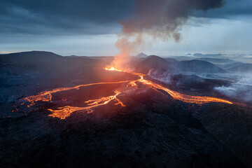 Scenic view of lava in the Fagradalsfjall volcano in Iceland on cloudy sky background