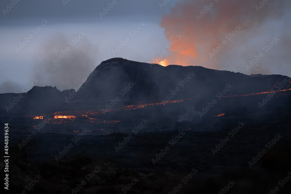 Wall mural scenic view of lava in the fagradalsfjall volcano in iceland on cloudy sky background