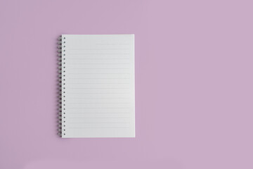 Blank page template of notepad on pink background isolated