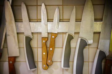 Closeup of knives on the wall