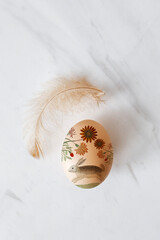 Easter egg decorated handmade with rabbit and flowers. Easter Background