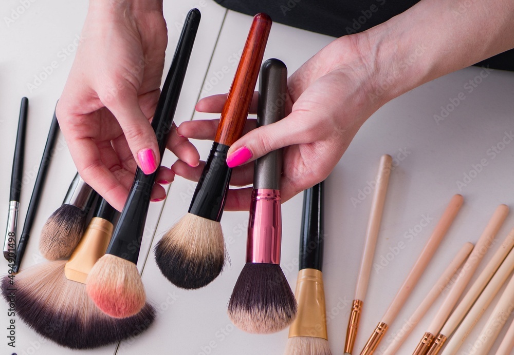 Wall mural Collection of make up products displayed on the table