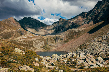 landscape in the mountains with little lake