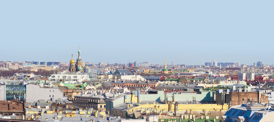Obraz premium Aerial panoramic view of Church of the Resurrection of Christ the Savior on Spilled Blood, Mikhailovsky Castle, Resurrection Smolny Cathedral in St Petersburg, Russia, skyline over building roofs
