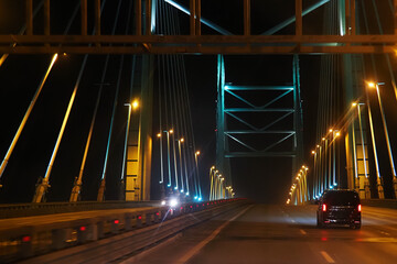 Cable-stayed bridge in St. Petersburg at night. Western High-speed Diameter. Modern transport...