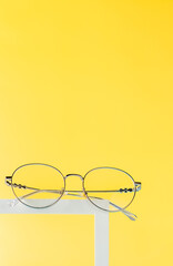glasses for vision on a bright background, eye protection and health