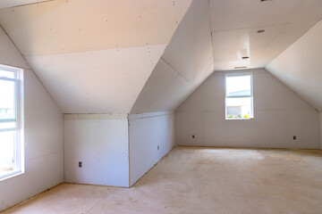 Under construction interior is installing drywall the room in new home