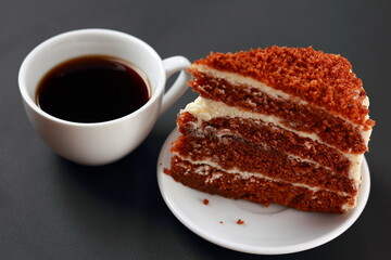 A cup of coffee with cake