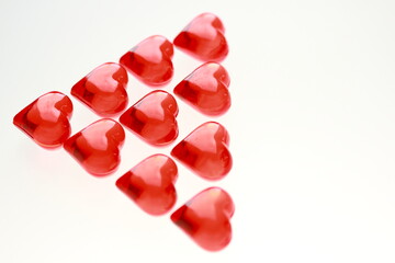 Shapes of colored hearts on a white background.