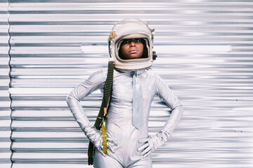 Black woman in spacesuit with helmet
