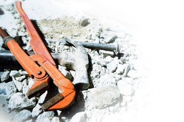 Wrench hammer for fixing water home system crack concrete white background for handyman service concept - Powered by Adobe