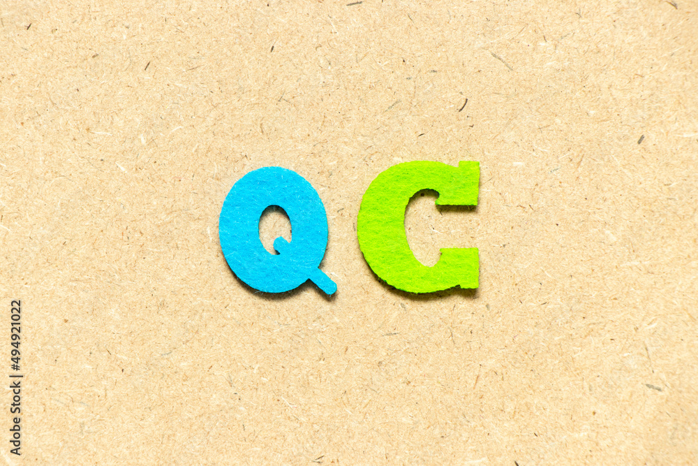 Canvas Prints Color cloth alphabet letter in word QC (Abbreviation of Quality Control) on wood background