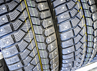 Winter vehicle tires stacked up for sale