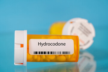 Hydrocodone. Hydrocodone pills in RX prescription drug bottle