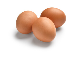 Brown eggs on white background