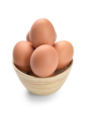 Bowl with brown eggs on white background