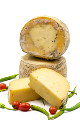 Goat cheddar cheese isolated on a white background. close up