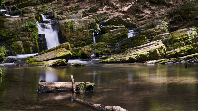Beautiful view of a waterfall in a forest in Harz, Germany