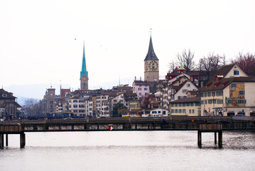 Old town of Zürich with protestant church and historic houses at City of Zürich on a cloudy spring day. Photo taken March 21st, 2022, Zurich, Switzerland.