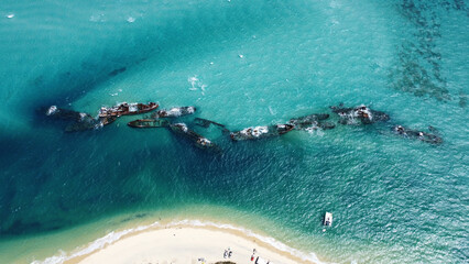 Aerial view of crashed boats in the sea, Moreton Island, Queensland, Gold Coast, Australia - obrazy, fototapety, plakaty