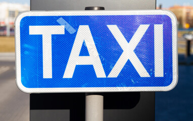 Taxi stop or stand sign. Taxicab rank, waiting area for cabs, parking zone blue information signage.