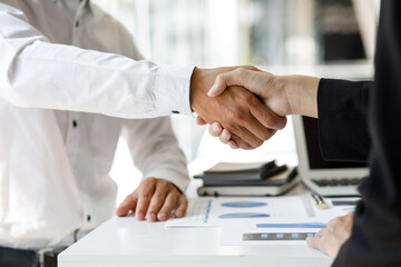 Businessman handshake for teamwork of business merger and acquisition,successful negotiate,hand...