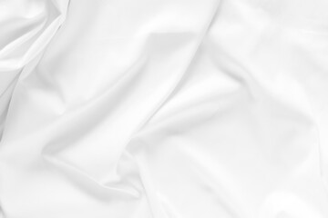 Obraz premium White fabric texture background. Cloth soft wave. Creases of satin, silk, and cotton.