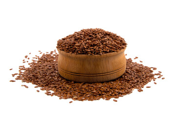Healthy brown linseeds in bowl isolated on white background.