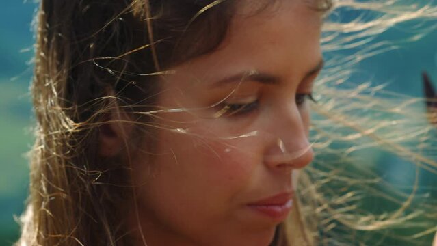 Inspired painter portrait at windy day. Talented artist hold brash in hand