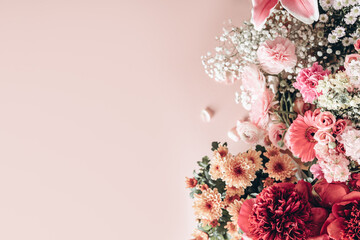 Different kinds of summer flowers such as ranunculus, lilies, peonies, chrysanthemums, gypsophila, carnations, lisianthus. Many flower bouquets after birthday party