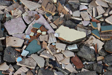Construction waste, broken ceramic tiles.