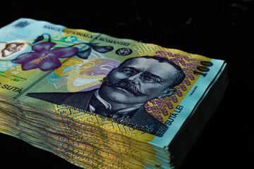 Closeup shot of a 100 leu banknotes stack